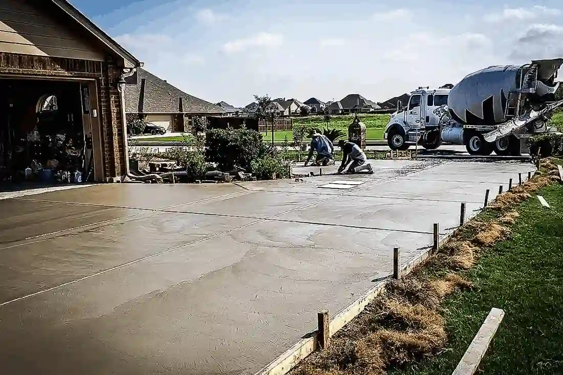 RL Concrete crew finishing a stamped concrete patio in San Antonio