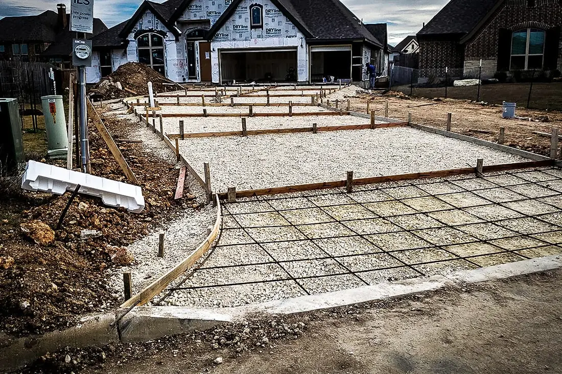 Concrete foundation slab being poured by RL Concrete crew