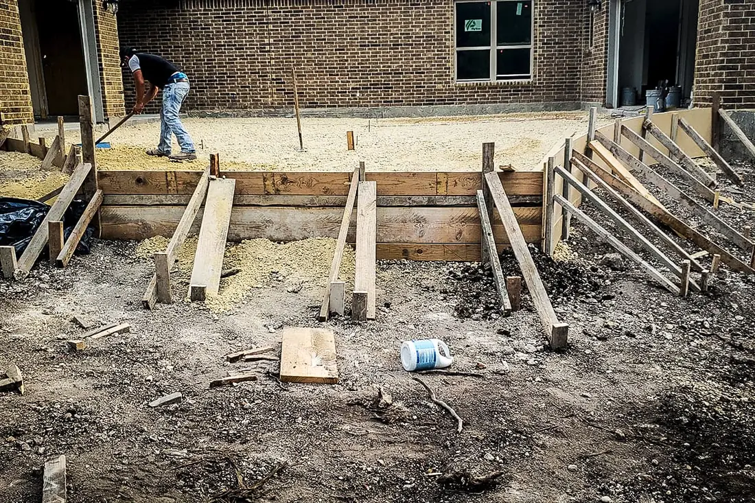 Timber formwork and base prep for a concrete slab at a commercial building in San Antonio